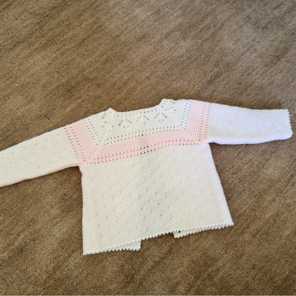 Absolutely gorgeous crochet baby sweater for a baby girl